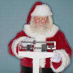 Santa Claus standing on scale