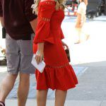 Hilary Duff pictured wearing a red dress on the Younger TV set in Downtown Manhattan